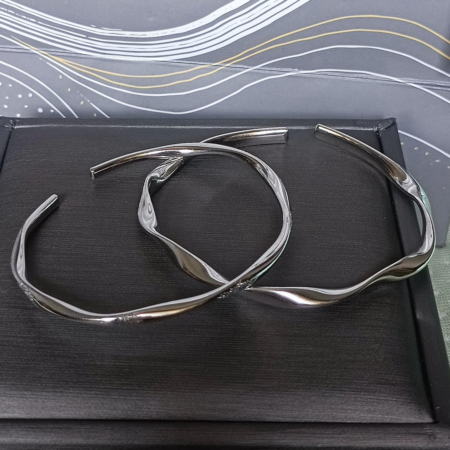 bimg_262_1 Unique Matching Infinity Couple Bangles In Sterling Silver