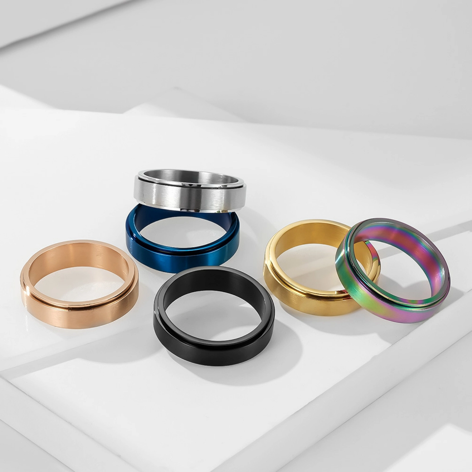 bimg_34_1 Engravable Matching Titanium Spinner Rings For Couples