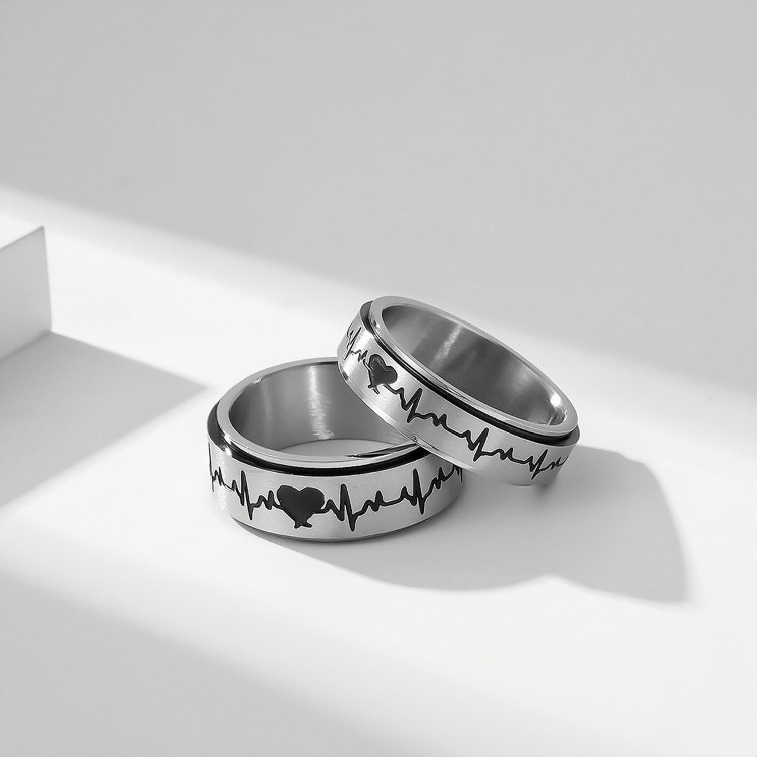 bimg_77_1 Rotatable Black And Silver Matching Heartbeat Couple Rings In Titanium